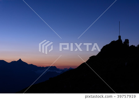 Northern Alps: A compass at the sunset of Mount Ashiga and Chogatake 39757919