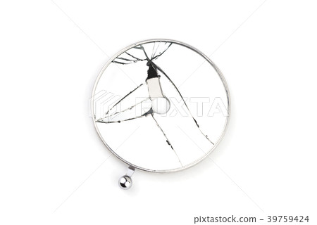 Broken round medical mirror 39759424