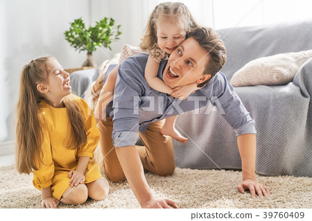 Daddy and his children playing Daddy and his children playing 39760409