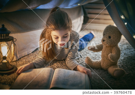 child is reading a book child is reading a book 39760478
