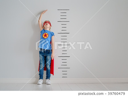 child is playing superhero child is playing superhero 39760479
