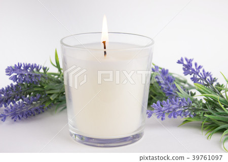 Candle in glass on white background with lavender 39761097