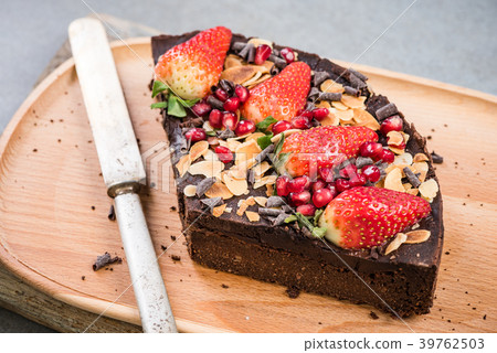Slice of healthy brownie with strawberry 39762503