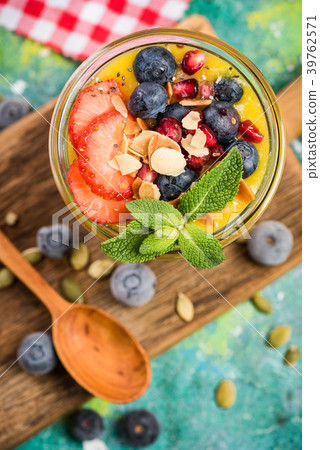 Jar with layered fruits and superfood. 39762571