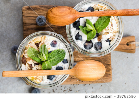 Blueberry and coconut musse layered in jar Blueberry and coconut musse layered in jar 39762580