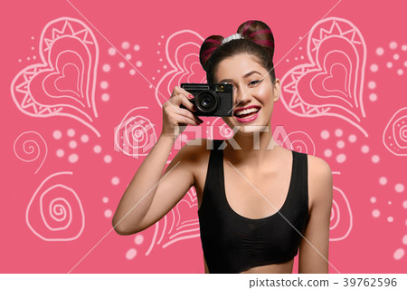 Young girl taking photo for pop art image. 39762596