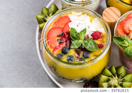 Mango puree and black rice in jar Mango puree and black rice in jar 39762615