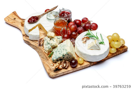 various types of cheese and jam on wooden cutting 39763259