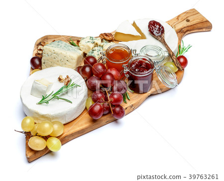 various types of cheese and jam on wooden cutting various types of cheese and jam on wooden cutting 39763261