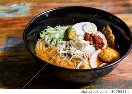 Serving of Nyonya Laksa, popular spicy noodle 39763314