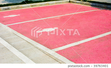 Bigger parking lot painted in pink for female Bigger parking lot painted in pink for female 39763401