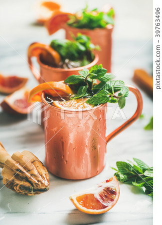 Blood orange Moscow mule alcohol cocktails in 39763496