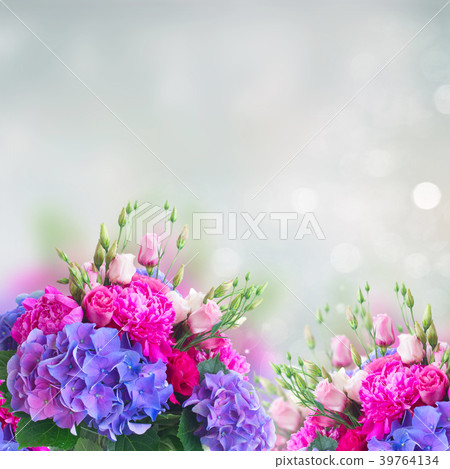 Bright pink and blue flowers Bright pink and blue flowers 39764134