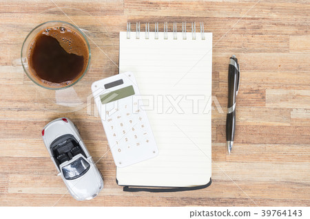 Toy car with notebook, calculator and coffee Toy car with notebook, calculator and coffee 39764143