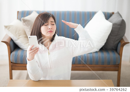Relaxing woman, smartphone, sofa Relaxing woman, smartphone, sofa 39764262