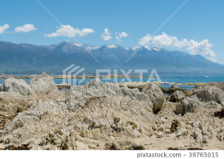 White volcano rock on sea shore 39765015