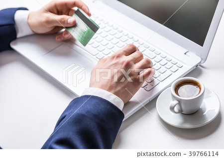 Man hands typing on the keyboard of laptop. Man hands typing on the keyboard of laptop. 39766114