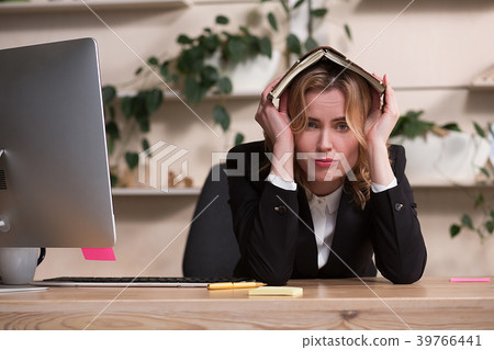 Young beautiful businesswoman is relaxing at Young beautiful businesswoman is relaxing at 39766441