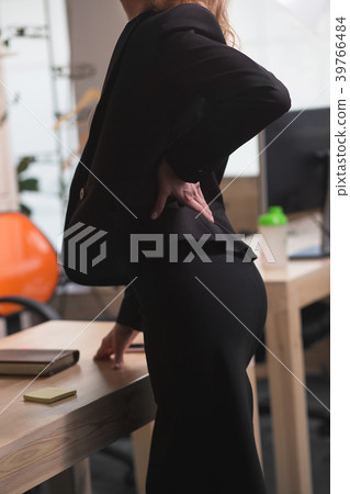 business woman having a back ache 39766484
