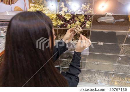 Beautiful woman in the spice market. 39767186