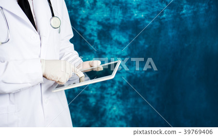 Doctor holding electronic tablet close up Doctor holding electronic tablet close up 39769406