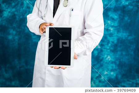 Doctor holding electronic tablet close up 39769409