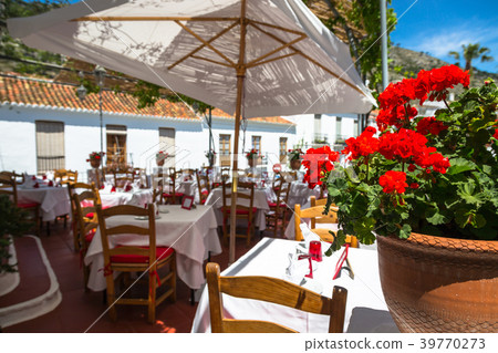 Street with flowers in the Mijas town, Spain 39770273