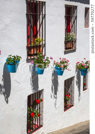 Street with flowers in the Mijas town, Spain Street with flowers in the Mijas town, Spain 39770277