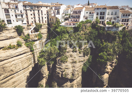 view of buildings over cliff in ronda, spain 39770505