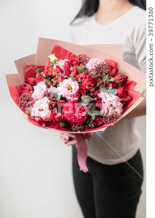 bouquet of beautiful flowers in women's hands bouquet of beautiful flowers in women's hands 39771380