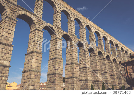The famous ancient aqueduct in Segovia, Castilla The famous ancient aqueduct in Segovia, Castilla 39771463