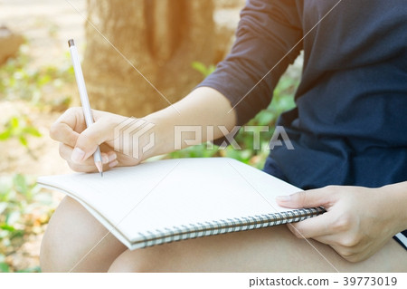 close up hands Students taking tests exams close up hands Students taking tests exams 39773019