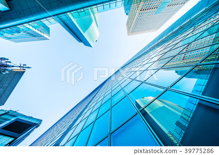 look up view of panoramic city skyline in tokyo  39775286