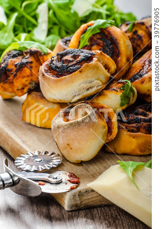 Pizza snails, minipizza with salad and parmagio 39776905