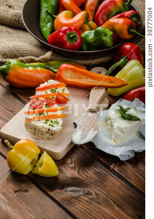 Healthy baguette, spread curd cheese with vegetable and herbs Healthy baguette, spread curd cheese with vegetable and herbs 39777004