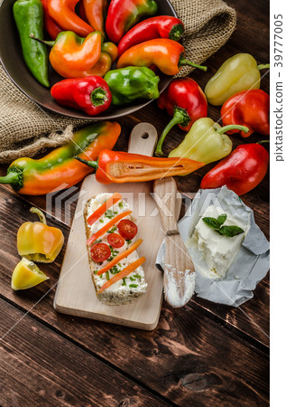 Healthy baguette, spread curd cheese with vegetable and herbs Healthy baguette, spread curd cheese with vegetable and herbs 39777005