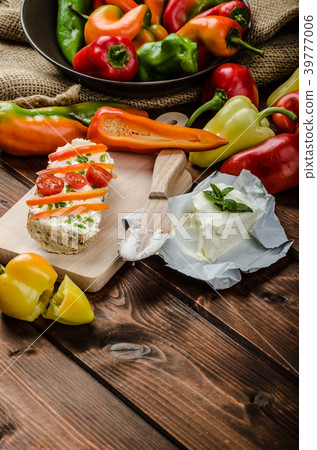 Healthy baguette, spread curd cheese with vegetable and herbs Healthy baguette, spread curd cheese with vegetable and herbs 39777006