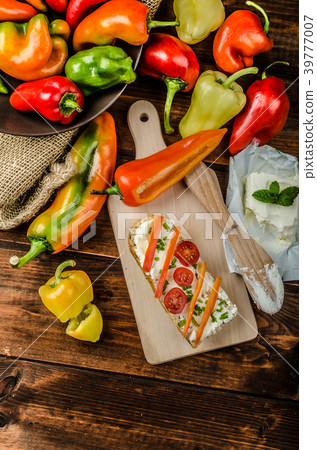 Healthy baguette, spread curd cheese with vegetable and herbs Healthy baguette, spread curd cheese with vegetable and herbs 39777007