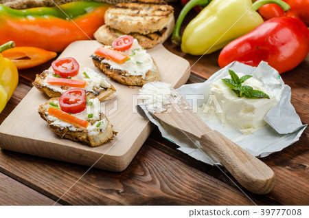 Healthy baguette, spread curd cheese with vegetable and herbs Healthy baguette, spread curd cheese with vegetable and herbs 39777008