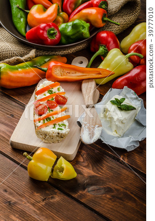 Healthy baguette, spread curd cheese with vegetable and herbs Healthy baguette, spread curd cheese with vegetable and herbs 39777010