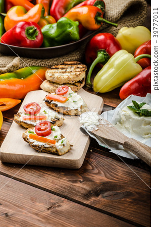 Healthy baguette, spread curd cheese with vegetable and herbs Healthy baguette, spread curd cheese with vegetable and herbs 39777011