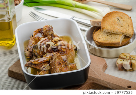 Roasted chicken parts with bio garlic, herb-garlic toast Roasted chicken parts with bio garlic, herb-garlic toast 39777525