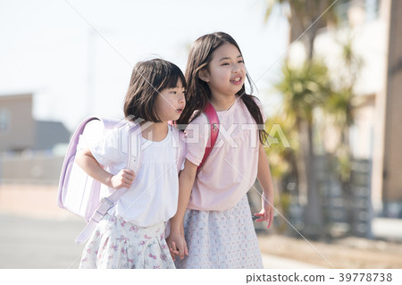 Two elementary school students who go to school 39778738