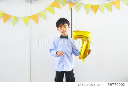 Boys enjoying a birthday party Boys enjoying a birthday party 39779002