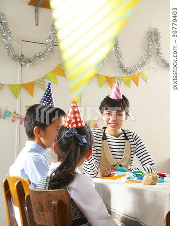 Children preparing for the party Children preparing for the party 39779403