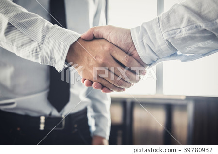 Handshake after good cooperation, Two Businessman handshake afte 39780932