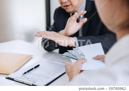 Bribery and corruption concept, senior businessman manager refus 39780962