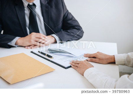 Bribery and corruption concept, bribe in the form of dollar bill 39780963