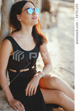 brunette girl exploring the beach brunette girl exploring the beach 39781205