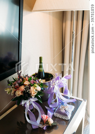 wedding bouquet, boutonniere, bottle of champagne 39781859